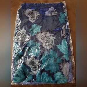 New Silky Flowered Scarf. Purchased in Bulgaria. Two-toned Blue In color.